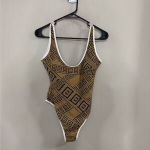 NWT Tan and Black Geometric One Piece Swimsuit